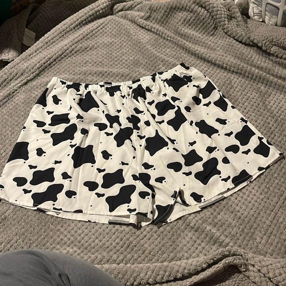 BLACK AND WHITE COW PRINT SHORTS